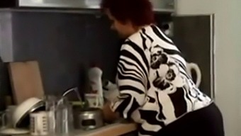 Voluptuous Mature Woman Gets Intimate With A Partner In The Kitchen